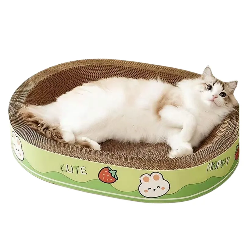 A fluffy cat resting in an oval corrugated cardboard scratcher with a green illustrated rim